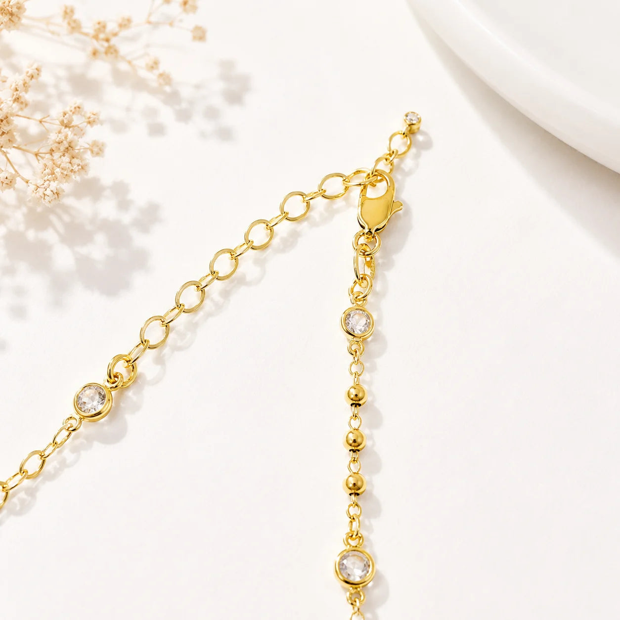 Beaded CZ necklace in 18k gold filled on silk, bezel-set stations curved