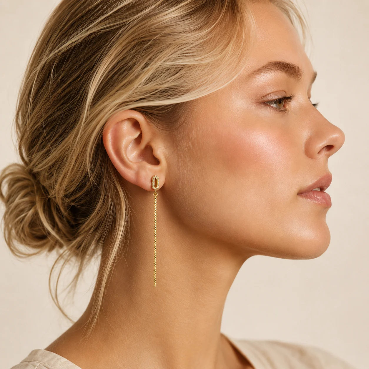 Side view of Ma Vie cascade drop earrings, 18k gold filled box chain drop with CZ stud