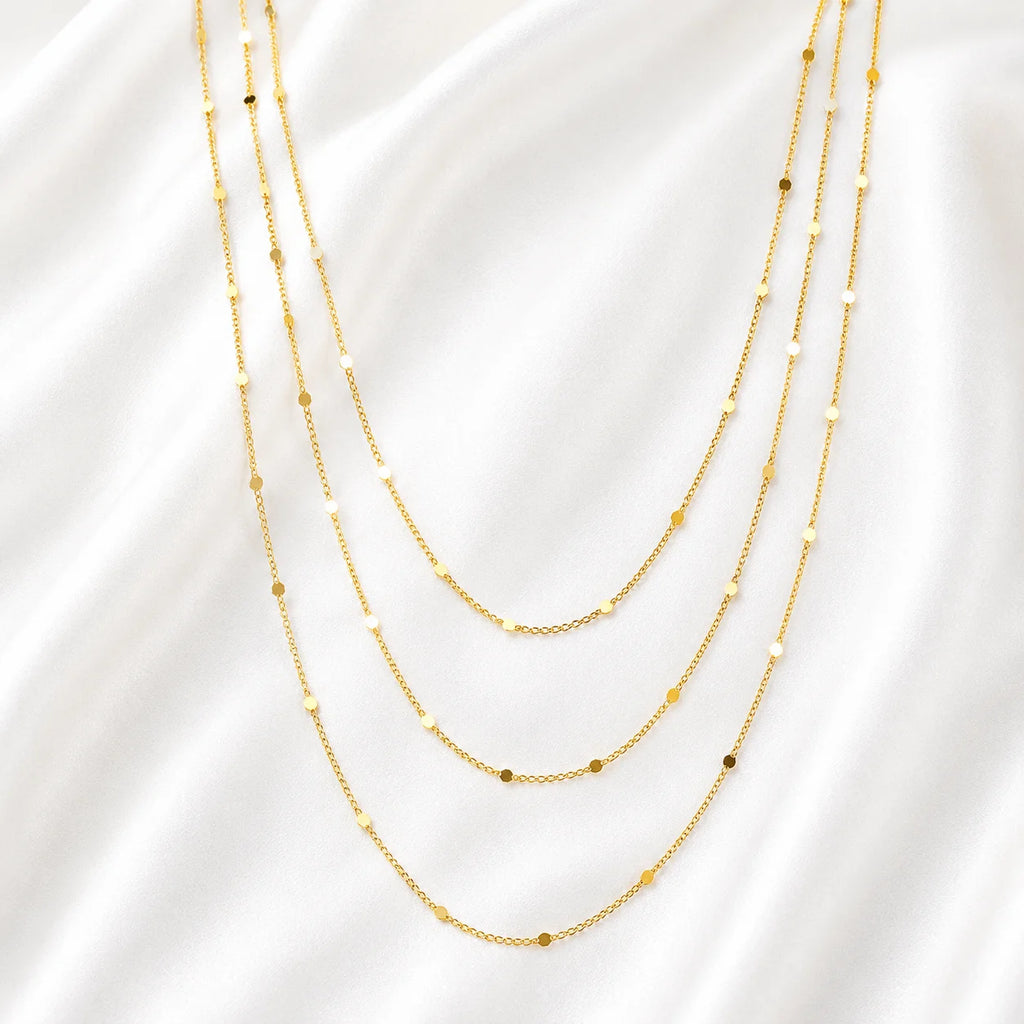 Ma Vie dainty curb chain necklace layered with other gold chains, 18k gold filled stacking