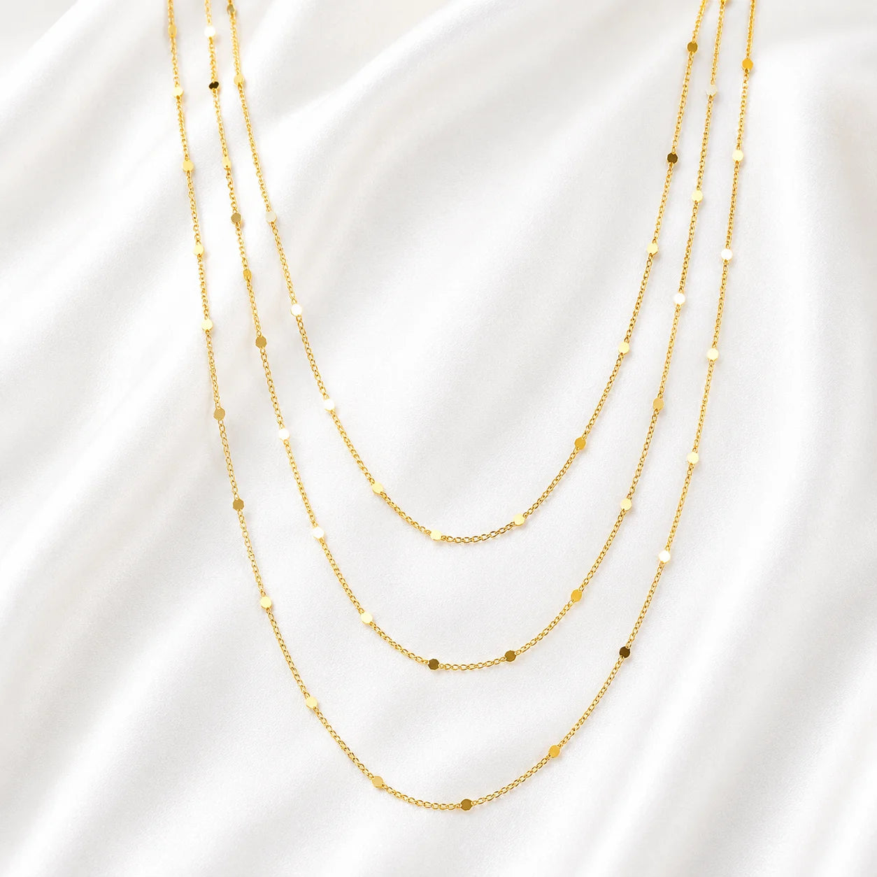Ma Vie dainty curb chain necklace layered with other gold chains, 18k gold filled stacking