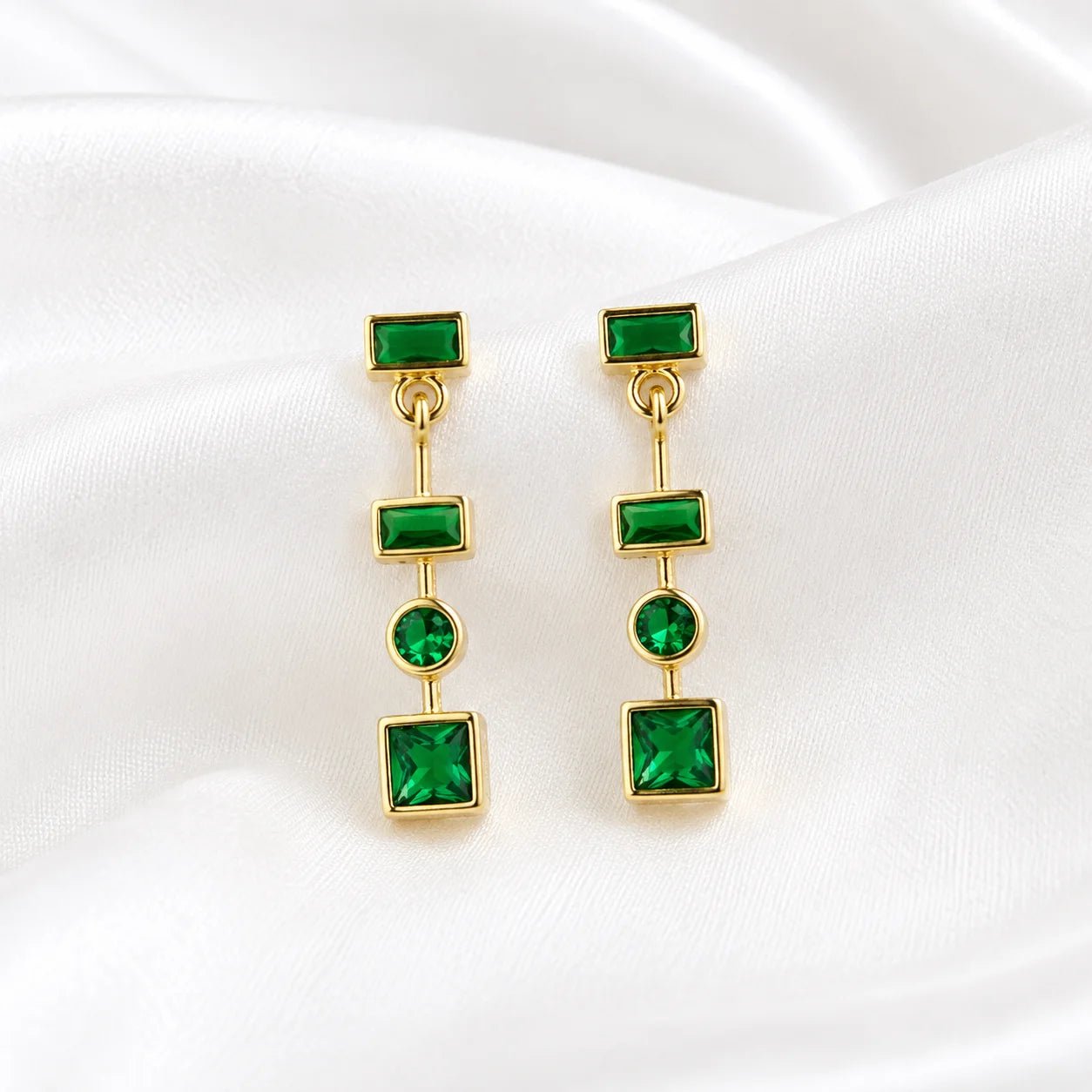 18K gold-filled emerald green CZ geometric drop earrings on ivory silk