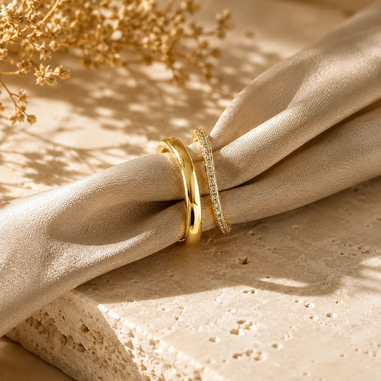 Open top wave ring in 18k gold filled standing on champagne silk, stackable band